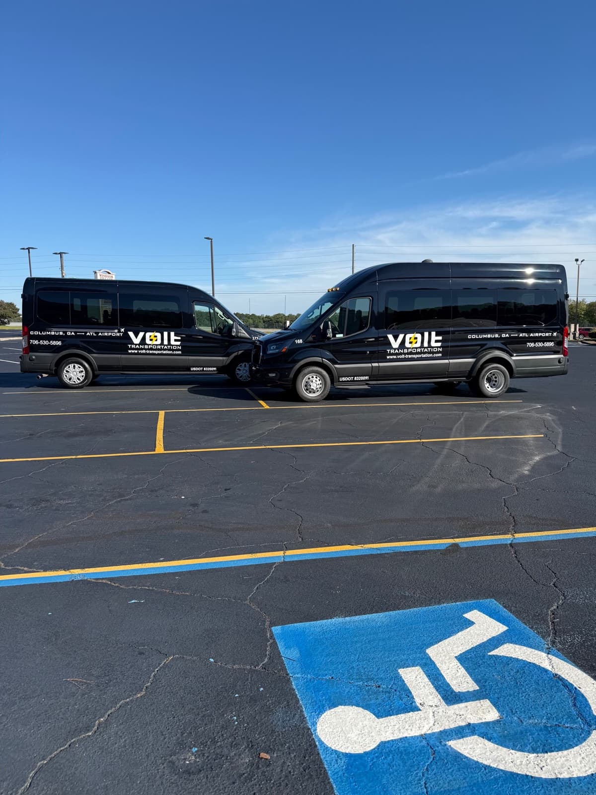 Two Volt Transportation passenger vans